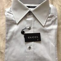 Fashion Track kotli ajk.Men’s Gucci light grey striped shirt . best quality and good products . different branded shirt available fashion Track kotli ajk